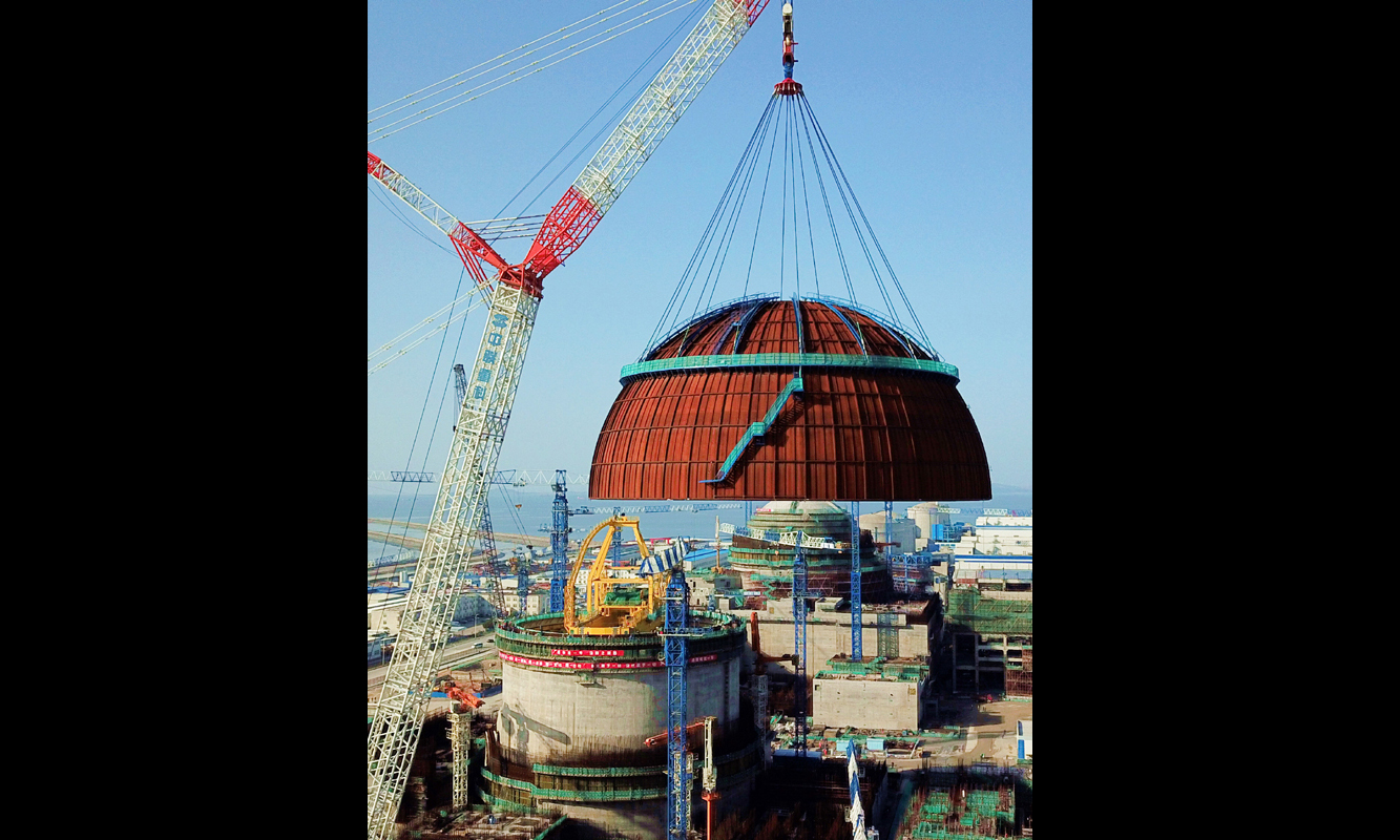 3月21日拍攝的中核集團福清核電6號機組反應堆穹頂吊裝現場（無人機拍攝）。（新華社記者 魏培全 攝）